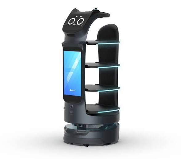 BellaBot Pro visto de frente com a tela lateral de anúncio acesa